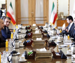 epa09803026 Iranian foreign minister Hossein Amir-Abdoulahian (L) talks to Rafael Grossi (R), head of the International Atomic Energy Agency (IAEA), in Tehran, Iran, 05 March 2022. Grossi is in Tehran to meet with Iranian officials following nuclear talks in Vienna.  EPA/ABEDIN TAHERKENAREH