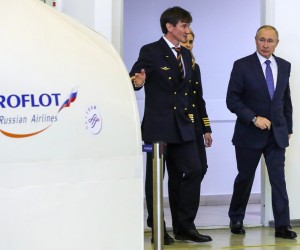 epa09803932 Russian President Vladimir Putin (R) examines simulators for the flight crew during his visit to the aviation training center of PJSC Aeroflot on the eve of International Women's Day in Moscow, Russia, 05 March 2022. The European Union imposed a ban on flights of Russian aircraft over its entire territory. As a mirror measure, Russia officially banned the use of its airspace by airlines from 36 countries. Russian troops entered Ukraine on 24 February prompting the country's president to declare martial law and triggering a series of severe economic sanctions imposed by Western countries on Russia.  EPA/MIKHAEL KLIMENTYEV/SPUTNIK/KREMLIN POOL / POOL