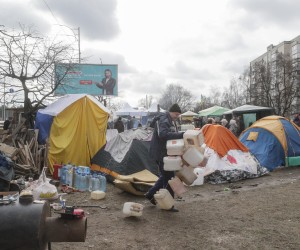 epa09805951 Members of the territorial defense unit in their camp near one of blockposts in Kyiv (Kiev), Ukraine, 06 March 2022. Russian troops entered Ukraine on 24 February leading to a massive exodus of Ukrainians to neighboring countries as well as internal displacements.  EPA/SERGEY DOLZHENKO