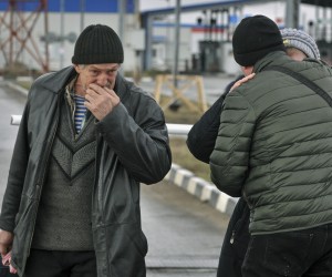 epa09808188 Refugees from Mariupol cross the border of Ukraine and Russia at the border crossing Veselo-Voznesenka in the Rostov region, Russia, 07 March 2022. The Interdepartmental Coordination Center for Humanitarian Response in Ukraine on 07 March reported that the Armed Forces of the Russian Federation declare a regime of silence and from 10 am open humanitarian corridors from four cities in Ukraine - Kyiv, Kharkov, Sumy and Mariupol. Later, Kyiv refused to open the humanitarian corridors proposed by Russia. Thousands of people want to leave Mariupol, but only 500 people managed to get out of there. Russian President Vladimir Putin announced a special military operation in the Donbas with the aim of demilitarising and denazifying Ukraine, as well as bringing to justice those who committed numerous bloody crimes against civilians. Martial law has been introduced in Ukraine, explosions are heard in many cities, including Kiev.  EPA/ARKADY BUDNITSKY