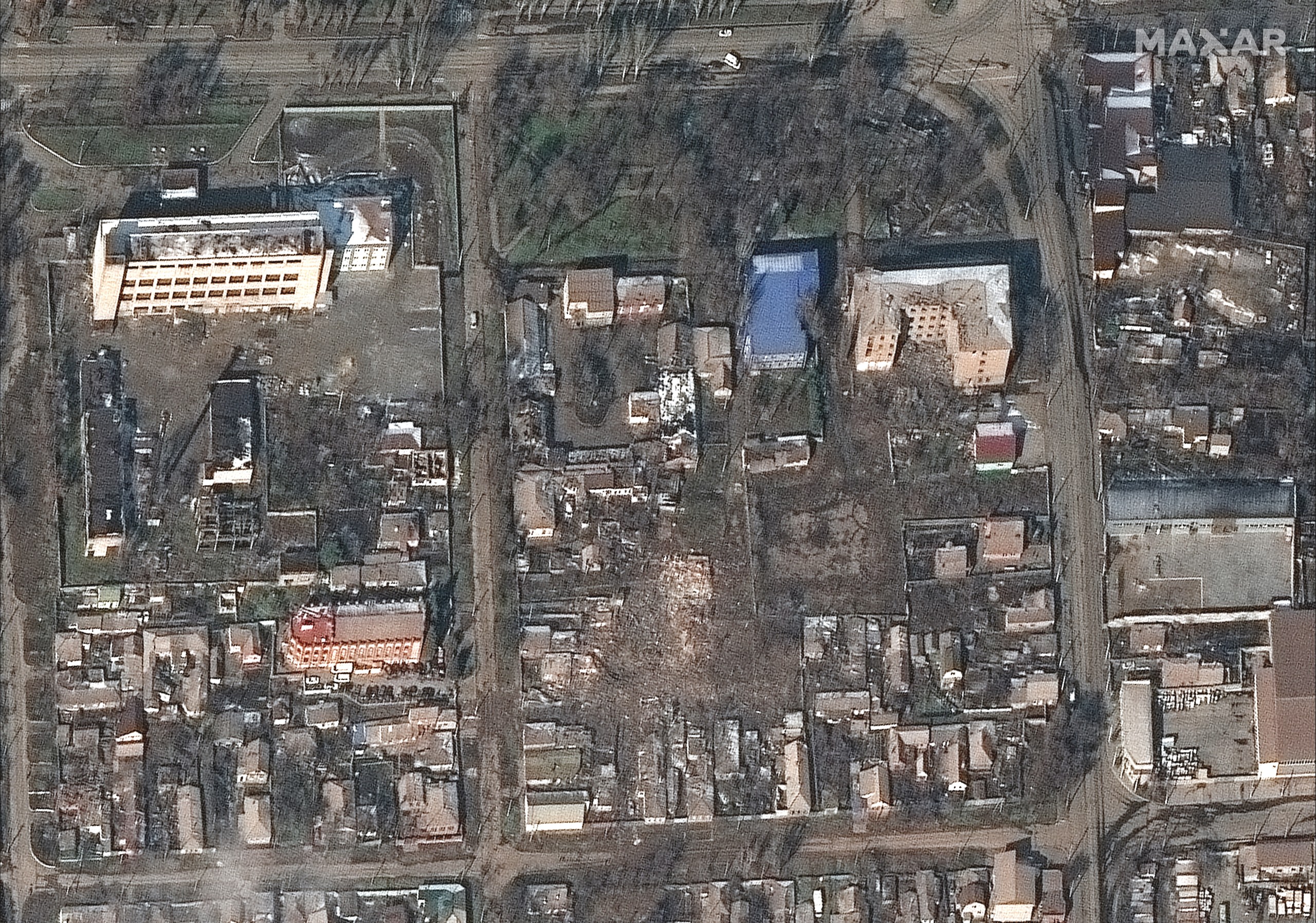 epa09813091 A handout satellite image made available by Maxar Technologies shows destroyed buildings and homes in Mariupol, Ukraine, 09 March 2022. Extensive damage is noted to the civilian infrastructure in and around the city, including residential homes, high-rise apartment buildings, grocery stores and shopping centers, Maxar says.  EPA/MAXAR TECHNOLOGIES HANDOUT -- MANDATORY CREDIT: SATELLITE IMAGE 2022 MAXAR TECHNOLOGIES -- THE WATERMARK MAY NOT BE REMOVED/CROPPED -- HANDOUT EDITORIAL USE ONLY/NO SALES