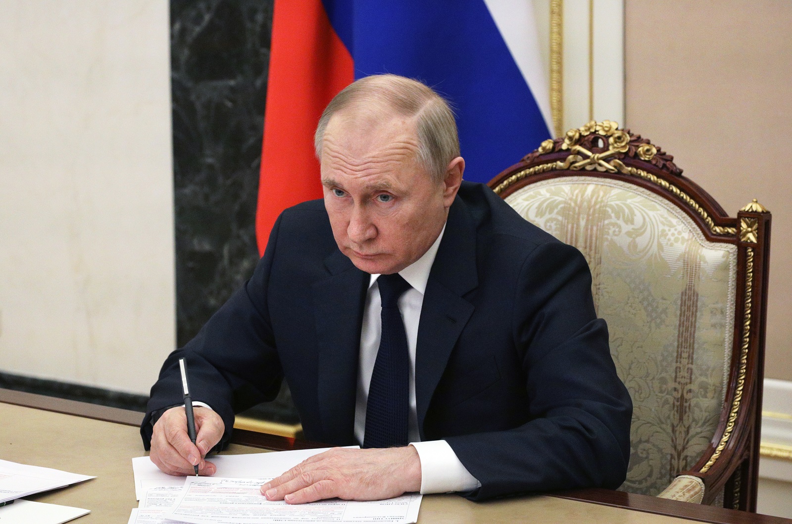 epa09815012 Russian President Vladimir Putin attends a videoconference meeting with Government members at the Kremlin in Moscow, Russia, 10 March 2022. The meeting focuses on minimising the impact of sanctions on the Russian economy. Russian troops entered Ukraine on 24 February prompting the country's president to declare martial law and triggering a series of severe economic sanctions imposed by Western countries on Russia.  EPA/MIKHAIL KLIMENTYEV / KREMLIN / SPUTNIK / POOL MANDATORY CREDIT