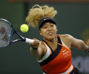 epa09820419 Naomi Osaka of Japan in action against Veronika Kudermetova of Russia at the BNP Paribas Open tennis tournament at the Indian Wells Tennis Garden in Indian Wells, California, USA, 12 March 2022.  EPA/JOHN G MABANGLO