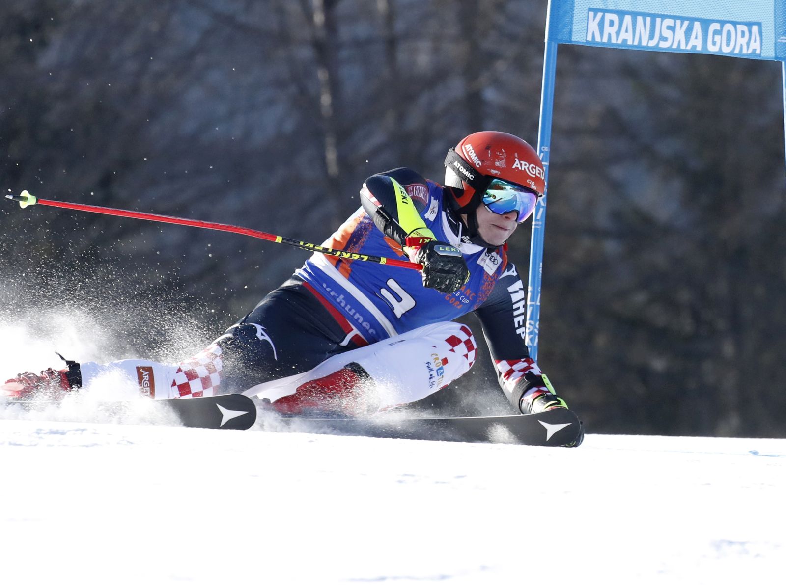 epa09820653 Filip Zubcic of Croatia clears a gate during the men's Giant Slalom race of the FIS Alpine Skiing World Cup event in Kranjska Gora, Slovenia, 13 March 2022.  EPA/ANTONIO BAT