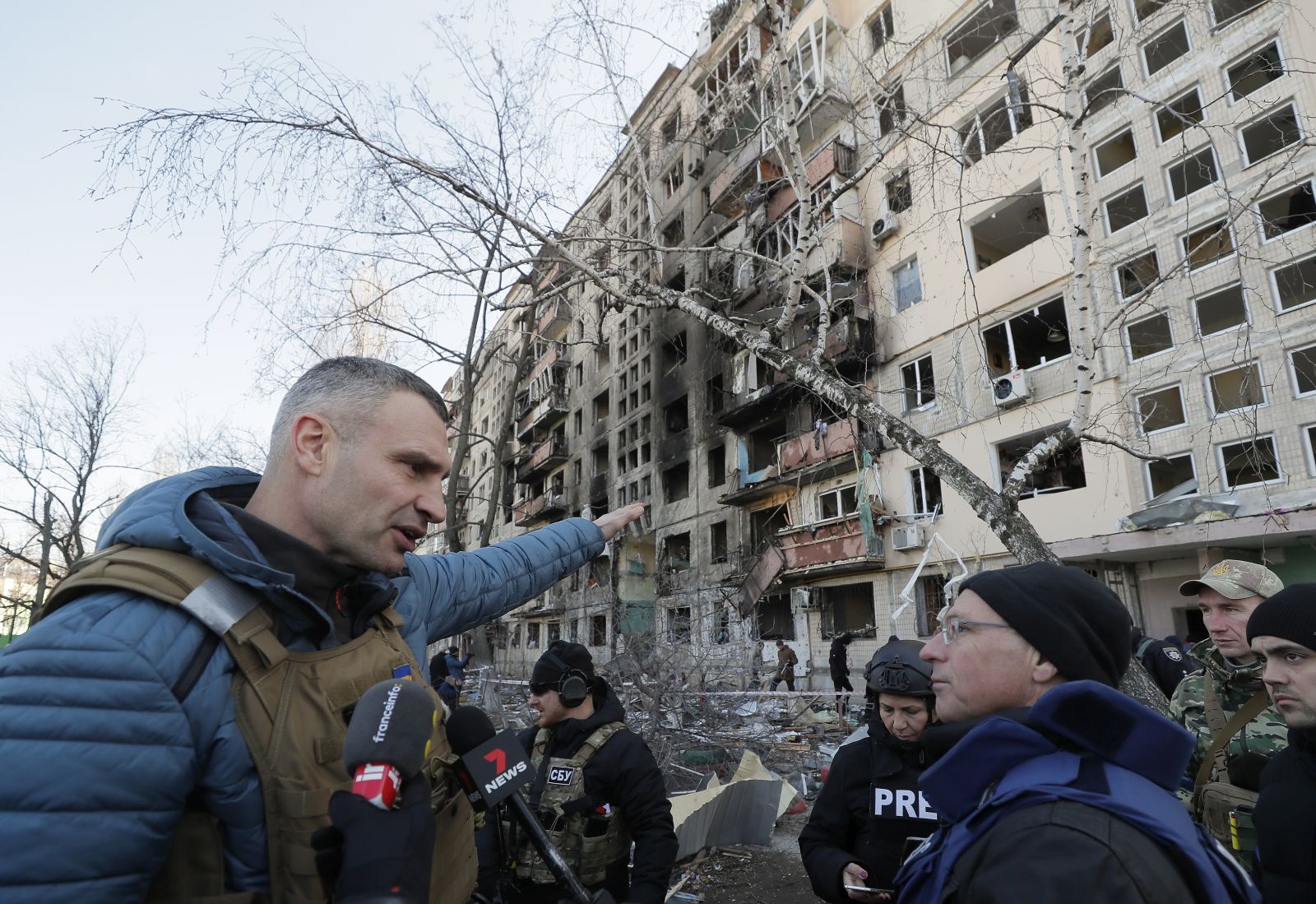 epa09824621 Kyiv's mayor Vitaliy Klitschko speaks with media near the shelled residential building in Kyiv (Kiev), Ukraine, 14 March 2022. Two persons died and three were injured during that shelling. Russian troops entered Ukraine on 24 February prompting the country's president to declare martial law and triggering a series of announcements by Western countries to impose severe economic sanctions on Russia.  EPA/SERGEY DOLZHENKO