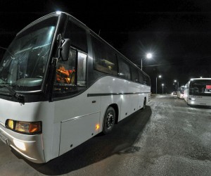 epa09827545 Buses with people evacuated from Mariupol arrive to the Ukraine-Russia border at the border crossing point Veselo-Voznesenka in the Rostov region, Russia, 15 March 2022. Civilians were able to leave the city, on 15 March, thanks to humanitarian corridors organised by the Russian military, with housing and food have been prepared in Russia for those who fled from Mariupol. On 24 February Russian troops had entered Ukrainian territory in what the Russian president declared a 'special military operation', resulting in fighting and destruction in the country, a huge flow of refugees, and multiple sanctions against Russia.  EPA/ARKADY BUDNITSKY