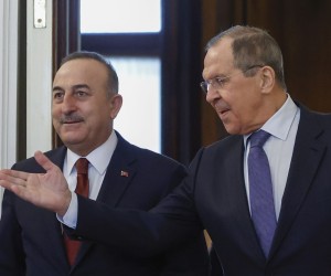 epa09828461 Russian Foreign Minister Sergei Lavrov (R) and Turkish Foreign Minister Mevlut Cavusoglu (L) enter a hall during a meeting in Moscow, Russia, 16 March 2022. Turkish Foreign Minister is on a working visit to Moscow.  EPA/MAXIM SHEMETOV / POOL
