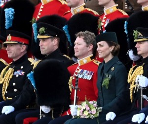epa09831297 Britain's William (3-L, seated) and Catherine (5-L, seated), Duke and Duchess of Cambridge pose for a formal photograph during a parade at Mons Barracks in Aldershot, Britain, 17 March 2022. The Duke and Duchess of Cambridge visited Mons Barracks to attend the Irish Guards parade to mark St. Patrick's Day during which the Duchess also presented shamrock to members of the 1st Battalion.  EPA/NEIL HALL