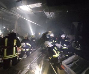 epa09840060 A handout photo released by the press service of the State Emergency Service of Ukraine on 21 March 2022 shows rescuers working at a damaged shopping center in the Podilskyi district of Kyiv (Kiev), Ukraine. According to a statement by the Ministry of Internal Affairs of Ukraine, the shopping center was damaged late 20 March as a result of Russian shelling.  EPA/STATE EMERGENCY SERVICE OF UKRAINE HANDOUT -- BEST QUALITY AVAILABLE -- MANDATORY CREDIT: STATE EMERGENCY SERVICE OF UKRAINE -- HANDOUT EDITORIAL USE ONLY/NO SALES