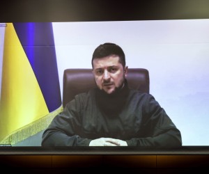 epa09843775 Ukrainian President Volodymyr Zelensky addresses Japan's lower house lawmakers via videolink at the House of Representatives office building in Tokyo, Japan, 23 March 2022.  EPA/BEHROUZ MEHRI / POOL