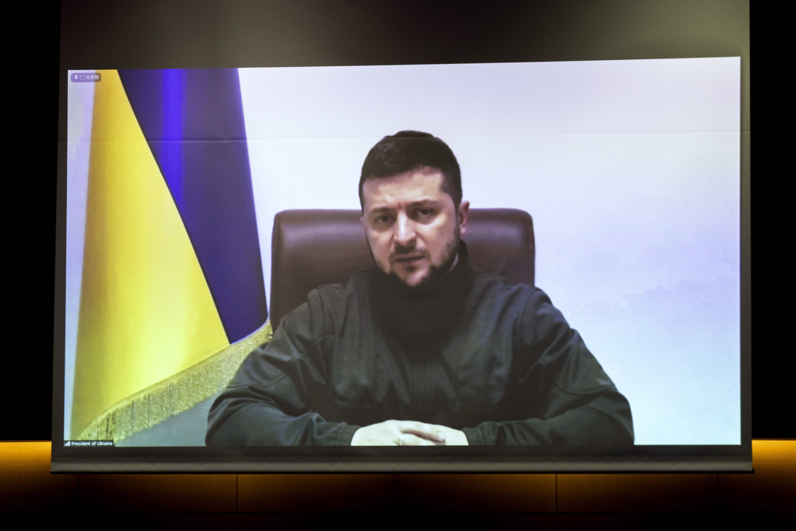 epa09843775 Ukrainian President Volodymyr Zelensky addresses Japan's lower house lawmakers via videolink at the House of Representatives office building in Tokyo, Japan, 23 March 2022.  EPA/BEHROUZ MEHRI / POOL