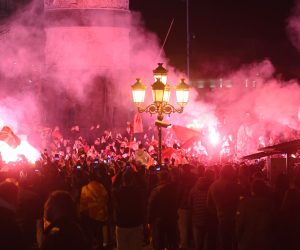 epa09847871 People waving North Macedonian flags and flares celebrate in Skopje, Republic of North Macedonia, 24 March 2022. North Macedonia stuns Italy after winning the FIFA World Cup Qatar 2022 play-off qualifying soccer match between Italy and North Macedonia in Palermo, Italy.  EPA/GEORGI LICOVSKI