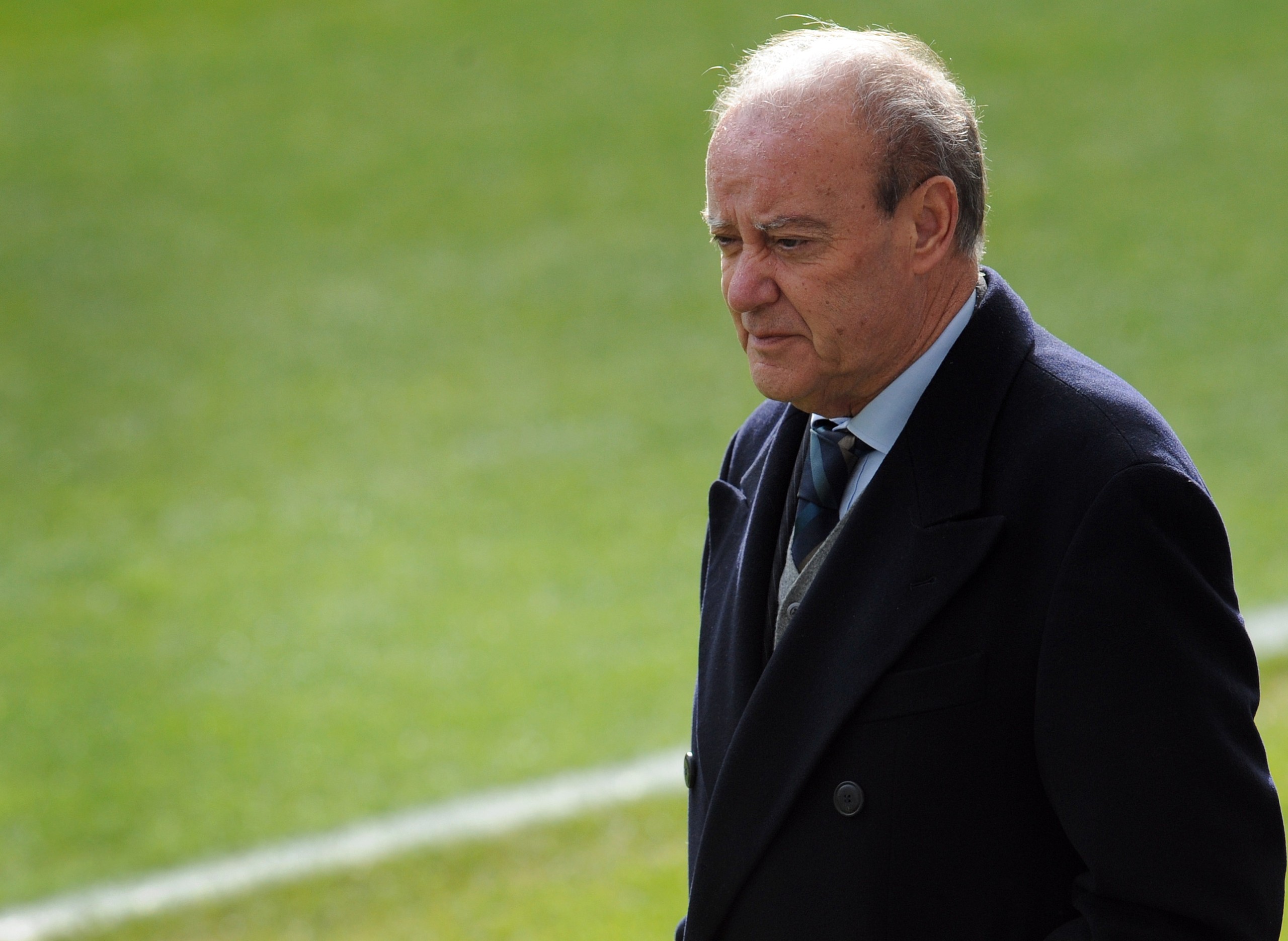 FC Porto's president Jorge Nuno Pinto da Costa is seen on the pitch prior to a training session at Porto's Dragon Stadium in Porto, Portugal, Tuesday, Feb. 16, 2010. FC Porto is due to play Arsenal in a Champions League round of 16 soccer match at the Dragao Stadium on Wednesday, Feb. 17. (AP Photo/Paulo Duarte)