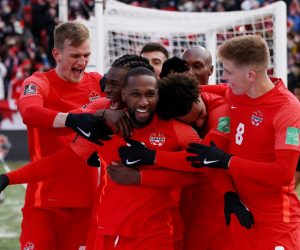 Soccer Football - World Cup - CONCACAF Qualifiers - Canada v Jamaica - BMO Field, Toronto, Canada - March 27, 2022 Canada's Junior Hoilett celebrates scoring their third goal with teammates REUTERS/Carlos Osorio