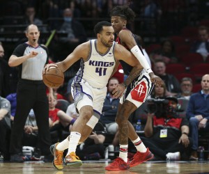 Apr 1, 2022; Houston, Texas, USA; Sacramento Kings forward Trey Lyles (41) drives with the ball as Houston Rockets guard Jalen Green (0) defends during the first quarter at Toyota Center. Mandatory Credit: Troy Taormina-USA TODAY Sports