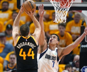 Dallas Mavericks center Dwight Powell (7) defends against Utah Jazz forward Bojan Bogdanovic (44) during the first half of Game 3 of an NBA basketball first-round playoff series Thursday, April 21, 2022, in Salt Lake City. (AP Photo/Rick Bowmer)