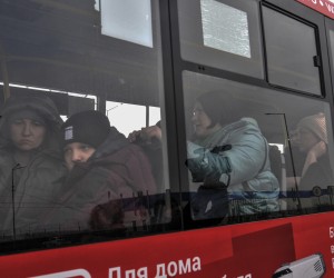 epa09808211 Refugees from Mariupol cross the Ukraine-Russia border at the border crossing Veselo-Voznesenka in the Rostov region, Russia, 07 March 2022. The Interdepartmental Coordination Center for Humanitarian Response in Ukraine on 07 March reported that the Armed Forces of the Russian Federation declare a regime of silence and from 10 am open humanitarian corridors from four cities in Ukraine - Kyiv, Kharkov, Sumy and Mariupol. Later, Kyiv refused to open the humanitarian corridors proposed by Russia. Thousands of people want to leave Mariupol, but only 500 people managed to get out of there. Russian President Vladimir Putin announced a special military operation in the Donbas with the aim of demilitarising and denazifying Ukraine, as well as bringing to justice those who committed numerous bloody crimes against civilians. Martial law has been introduced in Ukraine, explosions are heard in many cities, including Kiev.  EPA/ARKADY BUDNITSKY  EPA-EFE/ARKADY BUDNITSKY