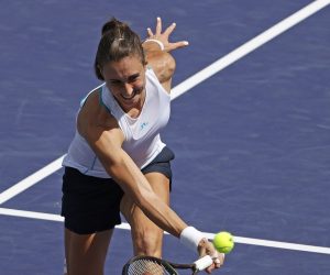 epa09822634 Petra Martic of Croatia in action against Emma Raducanu of Great Britain at the BNP Paribas Open tennis tournament at the Indian Wells Tennis Garden in Indian Wells, California, USA, 13 March 2022.  EPA/JOHN G MABANGLO