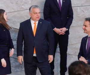 epa09845909 (L-R) Iceland's Prime Minister Katrin Jakobsdottir, Hungarian Prime Minister Viktor Orban and Greek Prime Minister Kyriakos Mitsotakis talk during a family picture for an extraordinary NATO Summit at the Alliance headquarters in Brussels, Belgium, 24 March 2022. NATO leaders will address the consequences of Russian President Putin's invasion of Ukraine, discuss the role of China in this crisis, and decide on the next steps to strengthen NATO's deterrence and defence.  EPA/STEPHANIE LECOCQ