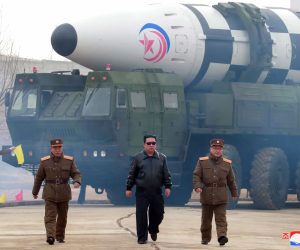 epaselect epa09848041 A photo released by the official North Korean Central News Agency (KCNA) shows Kim Jong Un (C), general secretary of the Workers' Party of Korea, president of the State Affairs of the Democratic People's Republic of Korea (DPRK), and supreme commander of the armed forces of the DPRK, Jang Chang-ha (L rear), Chief of the North's Academy of National Defense, and Kim Jong-sik (R), the Deputy Director of the Munitions Industry Department, during the test-launch of a new type of inter-continental ballistic missile Hwasongpho-17 of the DPRK strategic forces that was conducted on 24 March 2022 (issued 25 March 2022).  EPA/KCNA   EDITORIAL USE ONLY