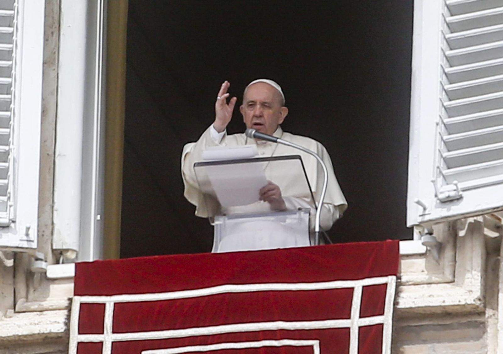 epa09852639 Pope Francis celebrates Sunday Angelus Prayer from the window of his office overlooking Saint Peter's Square at the Vatican, 27 March 2022.  EPA/FABIO FRUSTACI