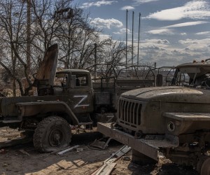epa09859923 Destroyed Russian military vehicles next to the railway station where the Russian forces were stationed, in the recaptured by the Ukrainian army Trostyanets town, in Sumy region, Ukraine, 29 March 2022 (issued 30 March 2022). Trostyanets was recaptured by the Ukrainian army after the town was under Russian forces from the first days of the war for over a month.  EPA/ROMAN PILIPEY