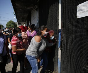 epa09862788 Women gather to receive information about relatives detained during the State of Exception, in San Salvador, El Salvador, 31 March 2022. The entry into force of a package of penal reforms, approved on 30 March by Congress and that include the prison for minors, mark the route that the Government decided to take against the gangs after a murder crisis that claimed the life of more than 80 people on the weekend. El Salvador has been under an emergency state since 27 March and the fifth day of suspension of constitutional guarantees is marked by these measures and the transfers to prisons of the detainees, which total about 3,000.  EPA/Rodrigo Sura