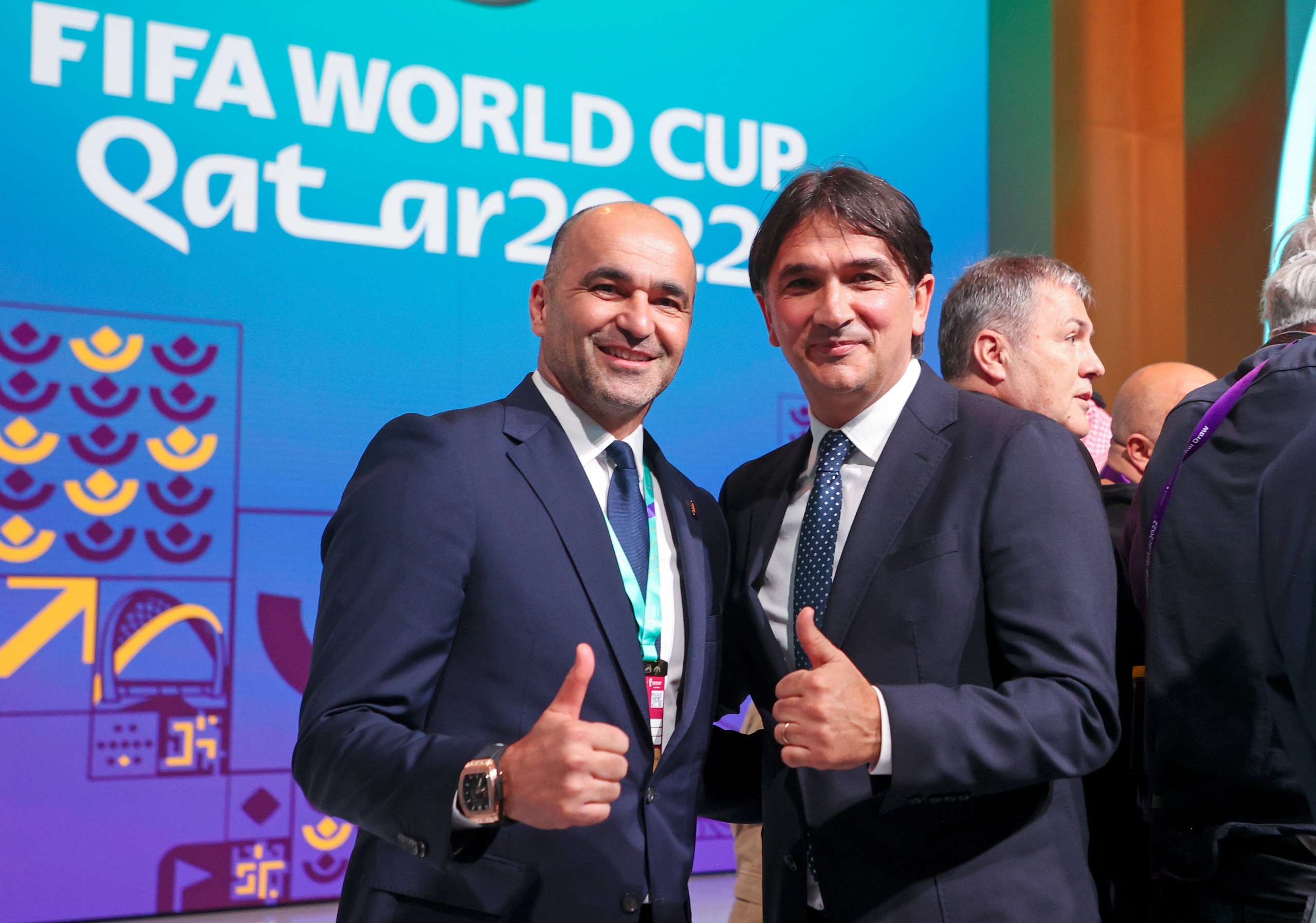 Doha, 01.04.2022 - Hrvatska nogometna reprezentacija igrat će u F skupini Svjetskoga prvenstva 2022 u Kataru zajedno sa selekcijama Belgije, Maroka i Kanade, odlučio je u petak ždrijeb u Dohi. Na slici hrvatski izbornik Zlatko Dalić i izbornik Belgije Roberto Martinez.
foto HINA/ Damir SENČAR/ ds