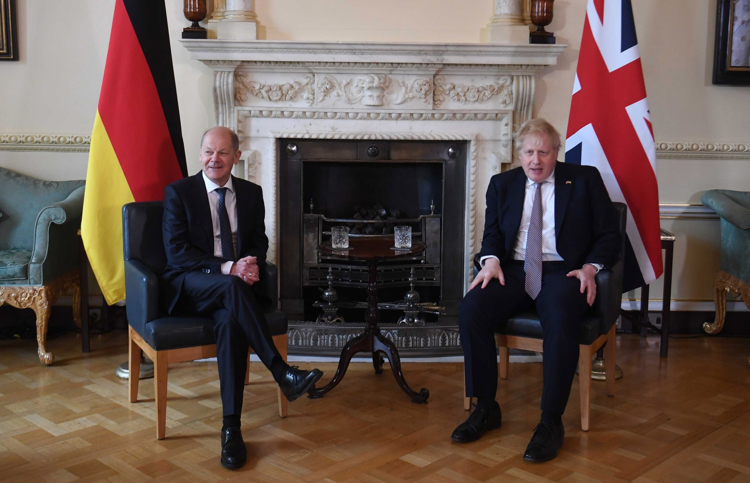 epa09878342 British Prime Minister Boris Johnson (R) meets with German Chancellor Olaf Scholz (L) at 10 Downing Street in London, Britain, 08 April 2022.  EPA/NEIL HALL / POOL