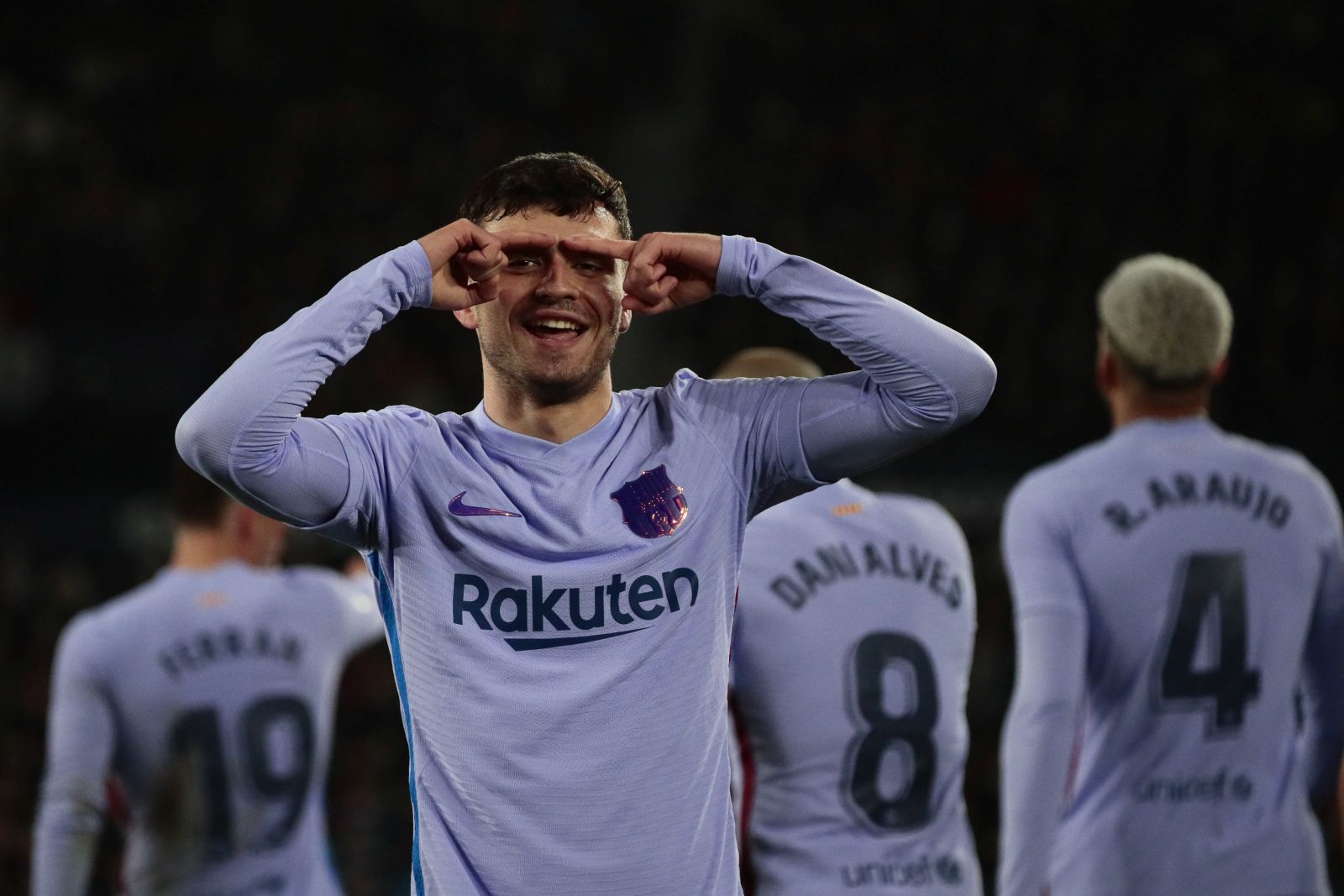 epa09883576 Barcelona's midfielder Pedri celebrates after scoring the 1-2 lead during the Spanish LaLiga soccer match between Levante UD and FC Barcelona at Ciutat de Valencia in Valencia, eastern, Spain, 10 April 2022.  EPA/BIEL ALINO