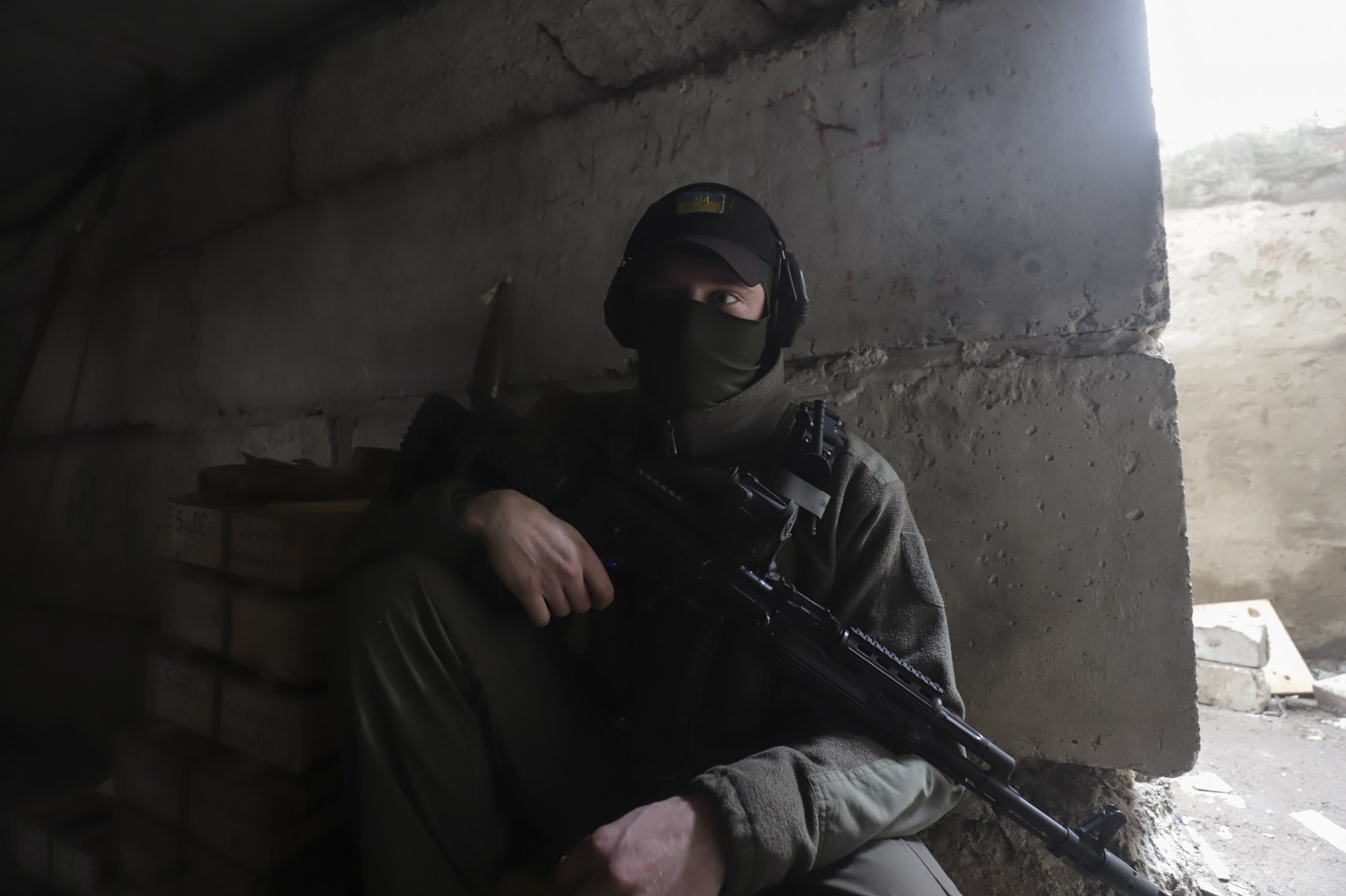 epa09893608 A Ukrainian serviceman rests in Severodonetsk, North-West of Luhansk, Ukraine, 16 April 2022. Russian troops entered Ukraine on 24 February resulting in fighting and destruction in the country and triggering a series of severe international economic sanctions on Russia.  EPA/STR