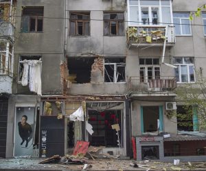 epa09894782 A damaged building in the aftermath of a shelling in Kharkiv, Ukraine, 17 April 2022. Kharkiv and its surrounding areas have been heavily shelled by Russian forces since the invasion of Ukraine began on 24 February.  EPA/SERGEY KOZLOV