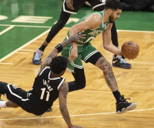 epa09899958 Boston Celtics forward Jayson Tatum (R) keeps the ball away from Brooklyn Nets guard Kyrie Irving (L) during the fourth quarter of the Eastern Conference first round playoff game two between the Brooklyn Nets and Boston Celtics at the TD Garden in Boston, Massachusetts, USA, 20 April 2022.  EPA/CJ GUNTHER SHUTTERSTOCK OUT