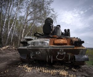 epa09904528 A destroyed tank stands on a road in Dergachi, Ukraine, 23 April 2022. On 24 February Russian troops had entered Ukrainian territory in what the Russian president declared a 'special military operation', resulting in fighting and destruction in the country, a huge flow of refugees, and multiple sanctions against Russia.  EPA/Maria Senovilla