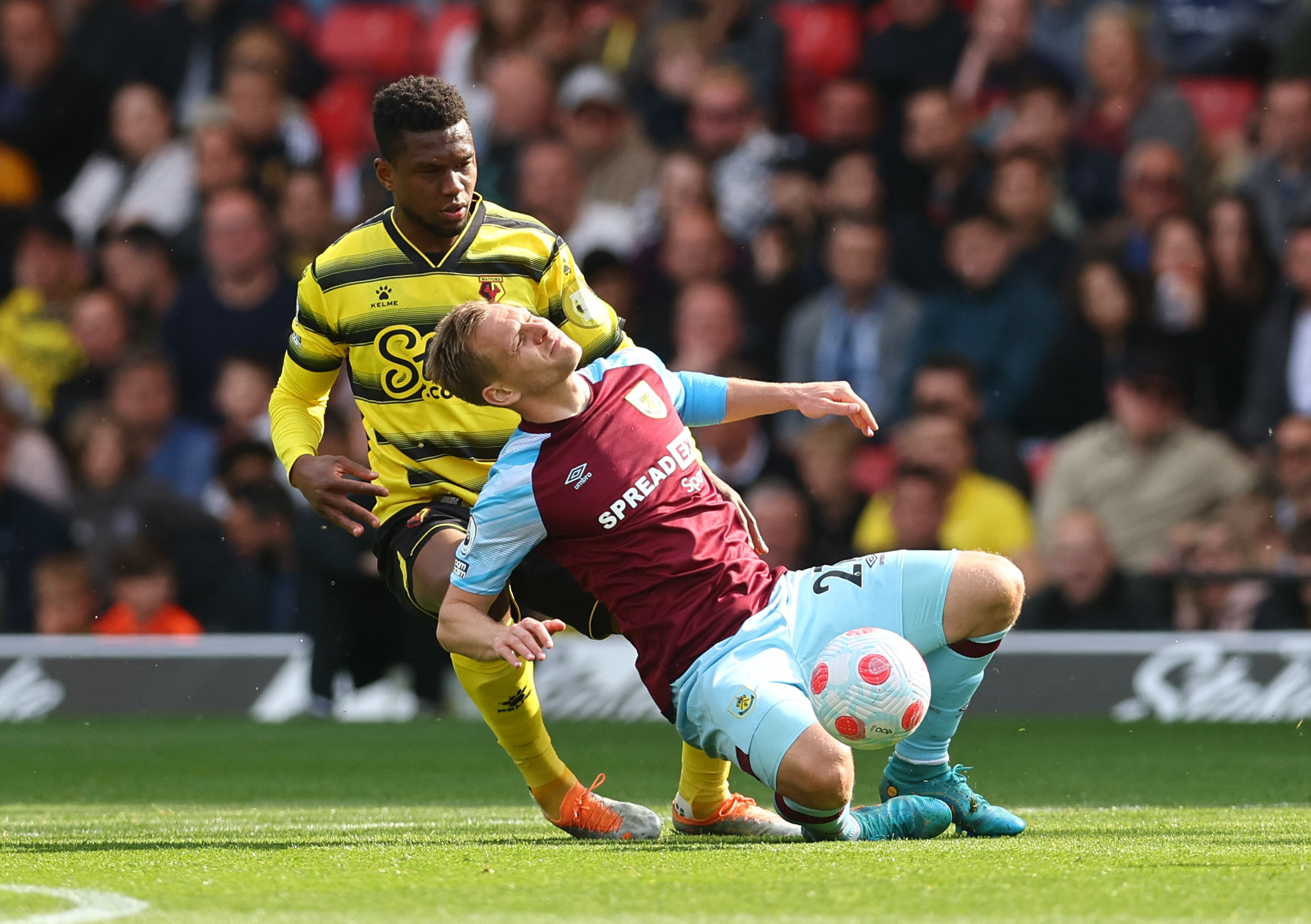 Soccer Football - Premier League - Watford v Burnley - Vicarage Road, Watford, Britain - April 30, 2022 Burnley's Matej Vydra in action with Watford's Christian Kabasele REUTERS/David Klein EDITORIAL USE ONLY. No use with unauthorized audio, video, data, fixture lists, club/league logos or 'live' services. Online in-match use limited to 75 images, no video emulation. No use in betting, games or single club /league/player publications.  Please contact your account representative for further details.