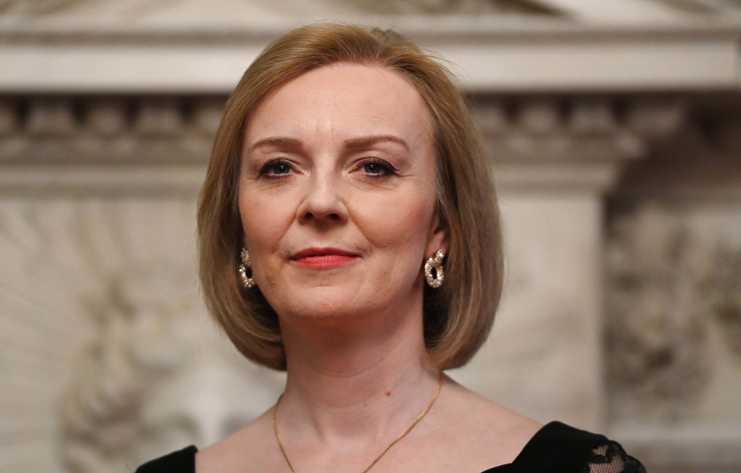 epa09912878 British Foreign Secretary Liz Truss during the annual Lord Mayor's Easter Banquet at the Mansion House in London, Britain, 27 April 2022. Foreign Secretary Truss is expected to call for increased defence spending to defend Ukraine in her speech to the City of London, and will also reiterate that the West "must be prepared for the long haul and double down on our support" for the country.  EPA/ANDY RAIN