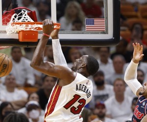 epa09923722 Miami Heat center Bam Adebayo (L) dunks around Philadelphia 76ers forward Tobias Harris (R) during the second half of game one of the NBA Eastern Conference semifinals series between the Miami Heat and the Philadelphia 76ers at FTX Arena in Miami, Florida, USA, 02 May 2022.  EPA/RHONA WISE  SHUTTERSTOCK OUT