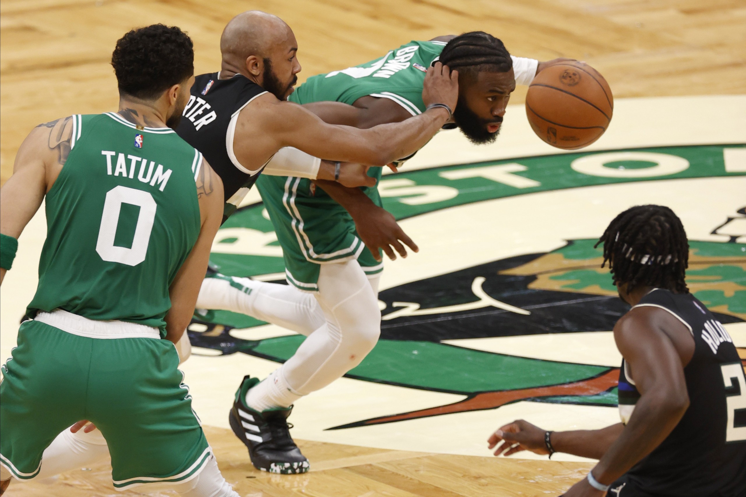 epa09925449 Boston Celtics guard Jaylen Brown (C) in action against Milwaukee Bucks center Bobby Portis (2-L) during the first half of the NBA Eastern Conference semifinal playoff game two between the Boston Celtics and the Milwaukee Bucs at TD Garden in Boston, Massachusetts, USA, 03 May 2022.  EPA/CJ GUNTHER  SHUTTERSTOCK OUT