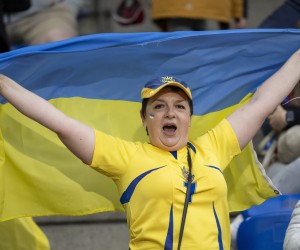 epa09926753 An Ukrainian fan cheers  during the Match for Peace charity soccer match between Switzerland's FC Basel 1893 and Ukraine's FK Dynamo Kiev at the St. Jakob-Park stadium in Basel, Switzerland,04 May 2022.  EPA/GEORGIOS KEFALAS
