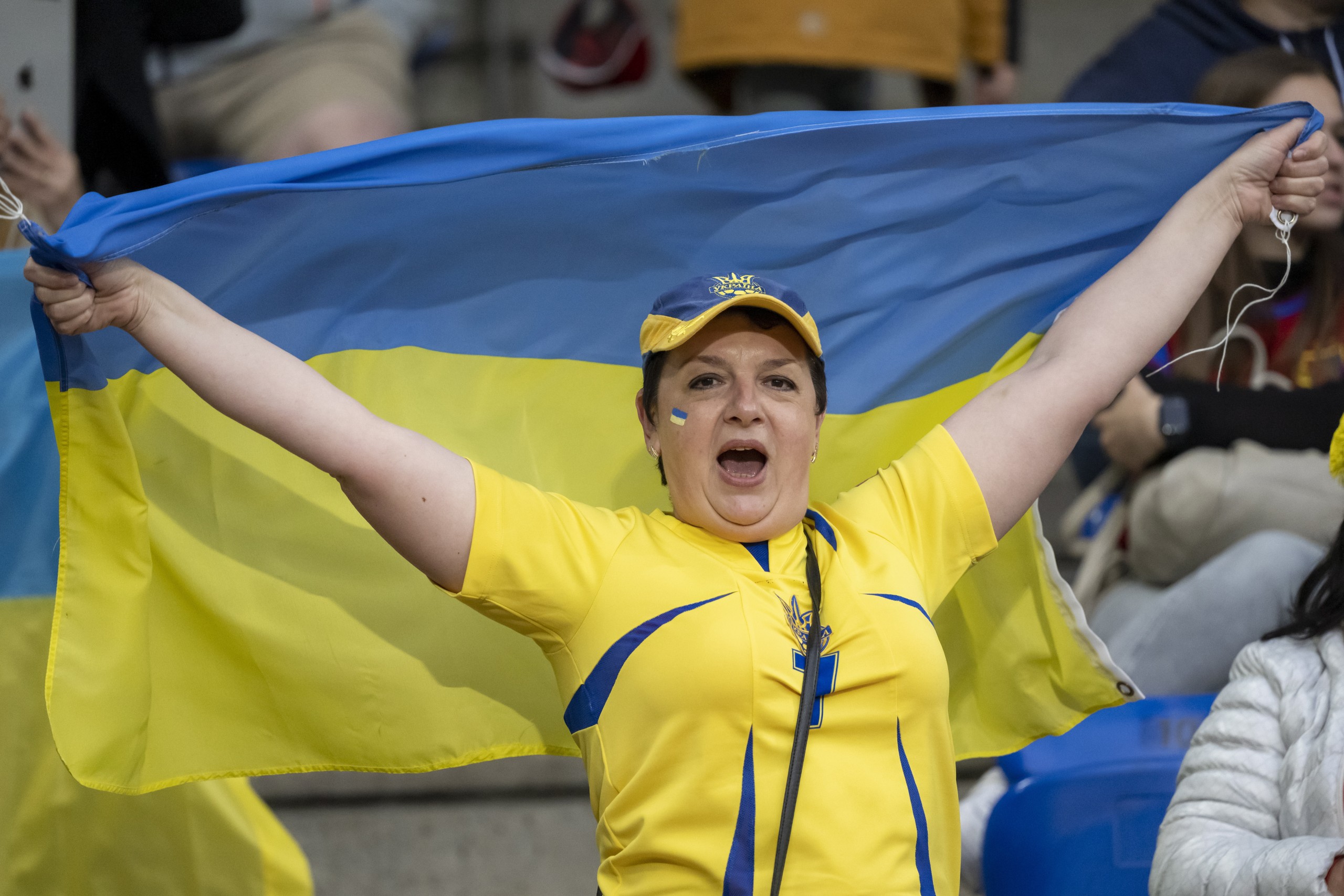 epa09926753 An Ukrainian fan cheers  during the Match for Peace charity soccer match between Switzerland's FC Basel 1893 and Ukraine's FK Dynamo Kiev at the St. Jakob-Park stadium in Basel, Switzerland,04 May 2022.  EPA/GEORGIOS KEFALAS