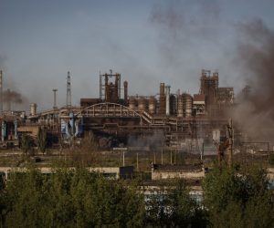 epa09932619 Smoke rises over Azovstal steel plant in Mariupol, Ukraine, 07 May 2022. According to the Interdepartmental Coordinating Headquarters of the Russian Federation for Humanitarian Response, 51 civilians, including 11 children, were evacuated from the Azovstal plant between 05 and 07 May. On 24 February, Russian troops had entered Ukrainian territory in what the Russian president declared a 'special military operation', resulting in fighting and destruction in the country. According to data released by the United Nations High Commission for the Refugees (UNHCR) on 05 May, over 5.7 million refugees have fled Ukraine seeking safety, protection and assistance in neighboring countries.  EPA/ALESSANDRO GUERRA