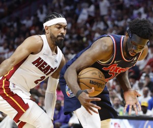 epa09939100 Philadelphia 76ers center Joel Embiid (R) is defended by Miami Heat guard Gabe Vincent (L) during the second half of the NBA Eastern Conference semifinals series between the Miami Heat and the Philadelphia 76ers at FTX Arena in Miami, Florida, USA, 10 May 2022.  EPA/RHONA WISE SHUTTERSTOCK OUT