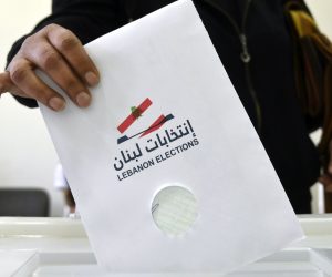 epa09941987 A Lebanese Government employee casts her ballot for the Lebanese parliamentary elections at a polling station in Beirut, Lebanon, 12 May 2022. Lebanese employees in charge of polling stations and their assistants in Sunday’s parliamentary elections have been casting their ballots, amid stringent security measures by the Lebanese Army and the Internal Security Forces, who are deployed near polling stations. Lebanese parliamentary elections in Lebanon are scheduled for 15 May 2022.  EPA/WAEL HAMZEH