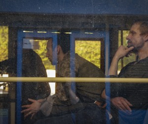 epa09953831 Ukrainian servicemen sitting in a bus as they are being evacuated from the besieged Azovstal steel plant in Mariupol, Ukraine, 17 May 2022. A total of 265 Ukrainian militants, including 51 seriously wounded, have laid down arms and surrendered to Russian forces, the Russian Ministry of Defence said on 17 May 2022. Those in need of medical assistance were sent for treatment to a hospital in Novoazovsk, the ministry states further. Russian President Putin on 21 April 2022 ordered his Defence Minister to not storm but to blockade the plant where a number of Ukrainian fighters were holding out. On 24 February, Russian troops invaded Ukrainian territory starting a conflict that has provoked destruction and a humanitarian crisis. According to the UNHCR, more than six million refugees have fled Ukraine, and a further 7.7 million people have been displaced internally within Ukraine since.  EPA/ALESSANDRO GUERRA