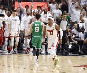 epa09954288 Miami Heat forward Jimmy Butler (R), reacts against the Boston Celtics during the second half of Game 1 of the NBA Eastern Conference Finals series between the Miami Heat and the Boston Celtics at FTX Arena in Miami, Florida, USA, 17 May 2022.  EPA/RHONA WISE  SHUTTERSTOCK OUT