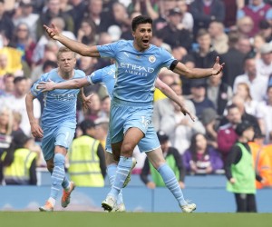 epa09966642 Rodri of Manchester City celebrates after scoring the 2-2 equalizer during the English Premier League soccer match between Manchester City and Aston Villa in Manchester, Britain, 22 May 2022.  EPA/ANDREW YATES EDITORIAL USE ONLY. No use with unauthorized audio, video, data, fixture lists, club/league logos or 'live' services. Online in-match use limited to 120 images, no video emulation. No use in betting, games or single club/league/player publications