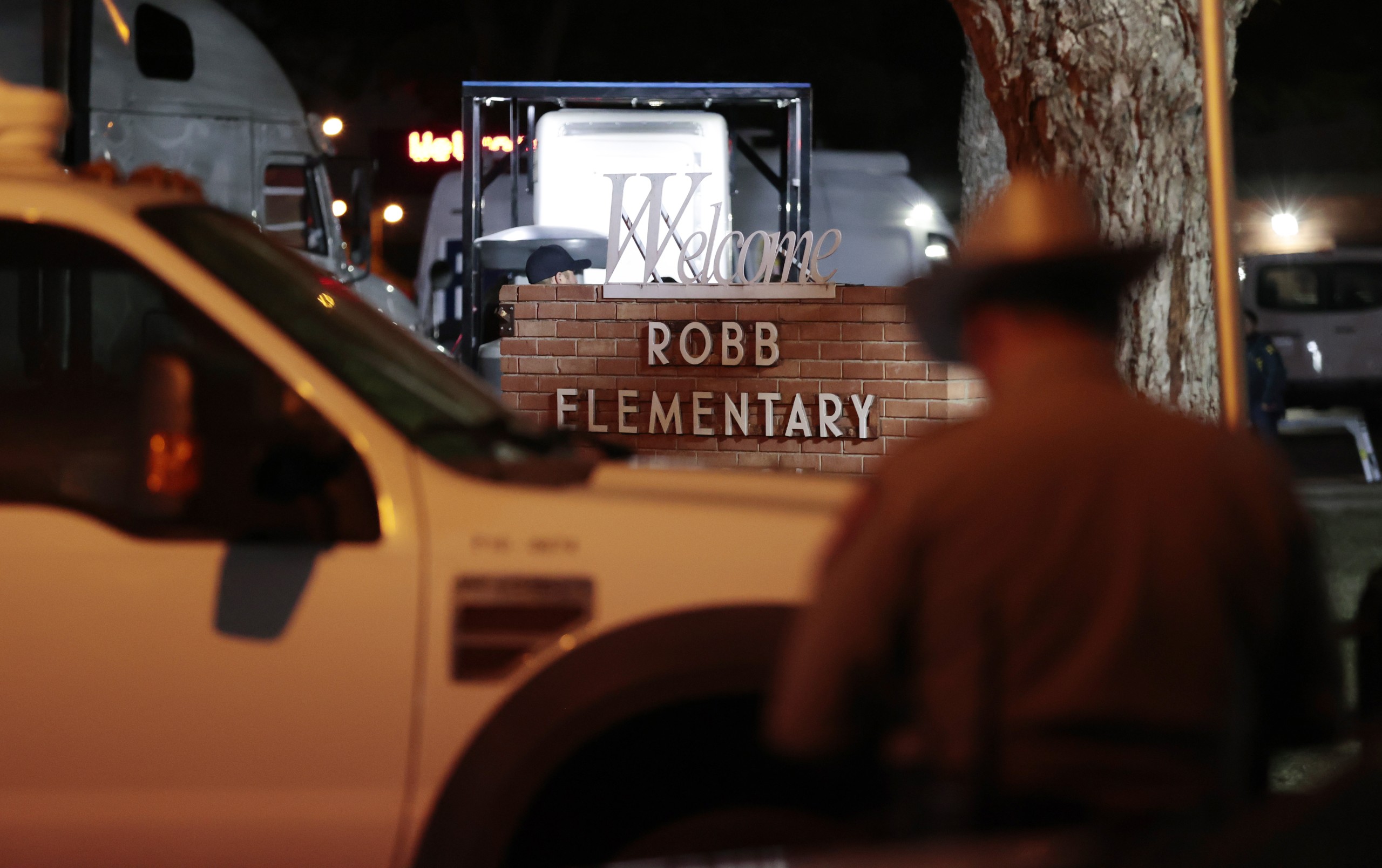 epaselect epa09973536 Police and investigators continue to work at the scene of a mass shooting at the Robb Elementary School in Uvalde, Texas, USA, 24 May 2022. According to Texas Governor Greg Abbott, at least 18 children and two adults were killed in the shooting. The eighteen-year-old gunman was killed by responding officers.  EPA/AARON M. SPRECHER