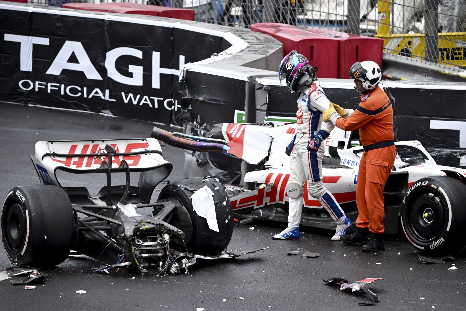 epa09984402 German Formula One driver Mick Schumacher of Haas F1 Team reacts next to his car after crashing out during the Formula One Grand Prix of Monaco at the Circuit de Monaco in Monte Carlo, Monaco, 29 May 2022.  EPA/CHRISTIAN BRUNA / POOL