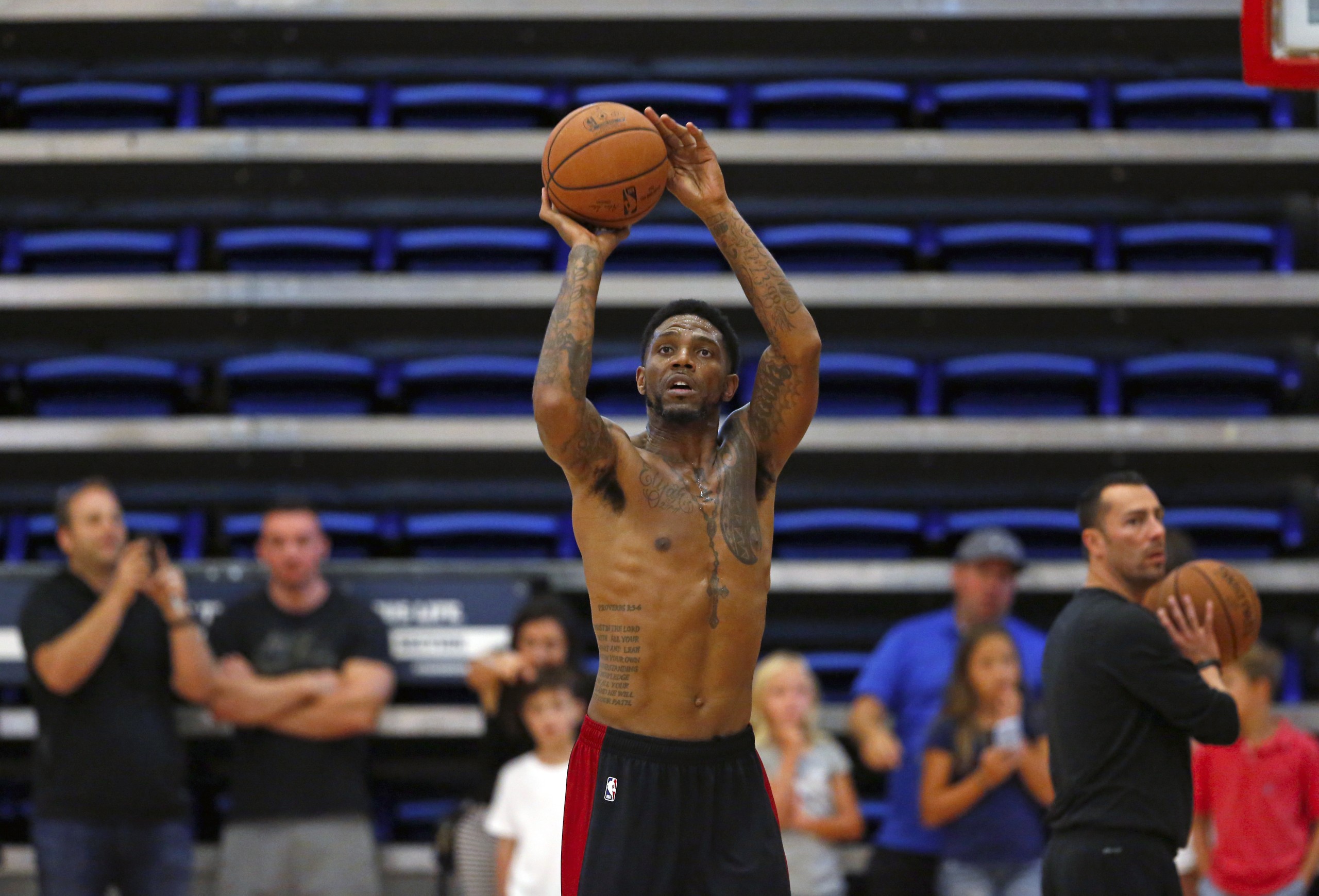 Miami Heat forward Udonis Haslem runs drills during practice on the last day of the Miami Heat NBA basketball team training camp in Boca Raton, Fla., Friday, Sept. 28, 2018. (David Santiago/Miami Herald via AP)