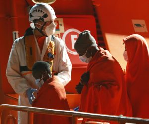 epaselect epa09946084 Migrants aboard a Spanish Sea Rescue ship arrive in the port of Arguineguin, Gran Canaria, Spain, late 13 May 2022 (issued 14 May 2022). Spanish authorities rescued two boats carrying 61 and 32 migrants respectively, off the coasts of the Canary Islands.  EPA/Elvira Urquijo A.